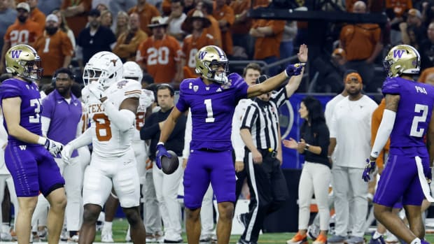 Washington Huskies wide receiver Rome Odunze (1) reacts after a play against the Texas Longhorns during the second quarter of the 2024 Sugar Bowl college football playoff semifinal game at Caesars Superdome. 
